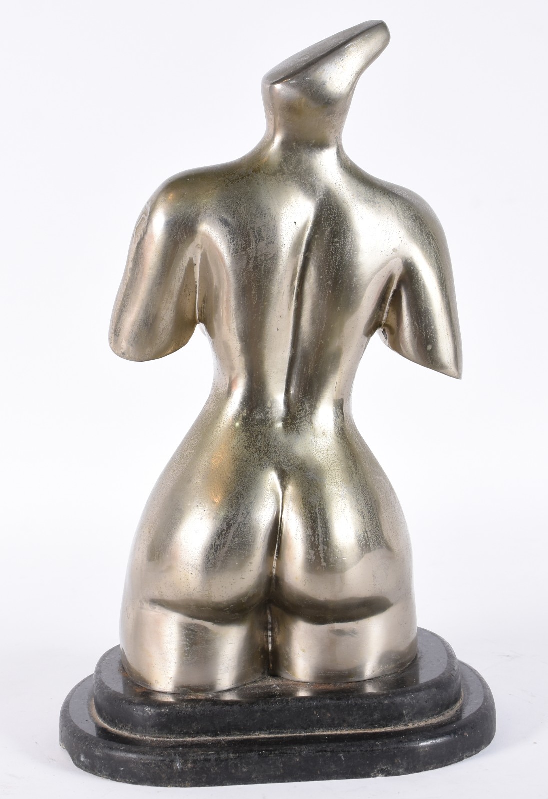 Escultura de metal representando dorso feminino. - foto 3 de 4