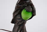 Escultura de petit bronze, representando menino... - Escultura de petit bronze, representando menino c/ lampião.  Alt. 35 cm
