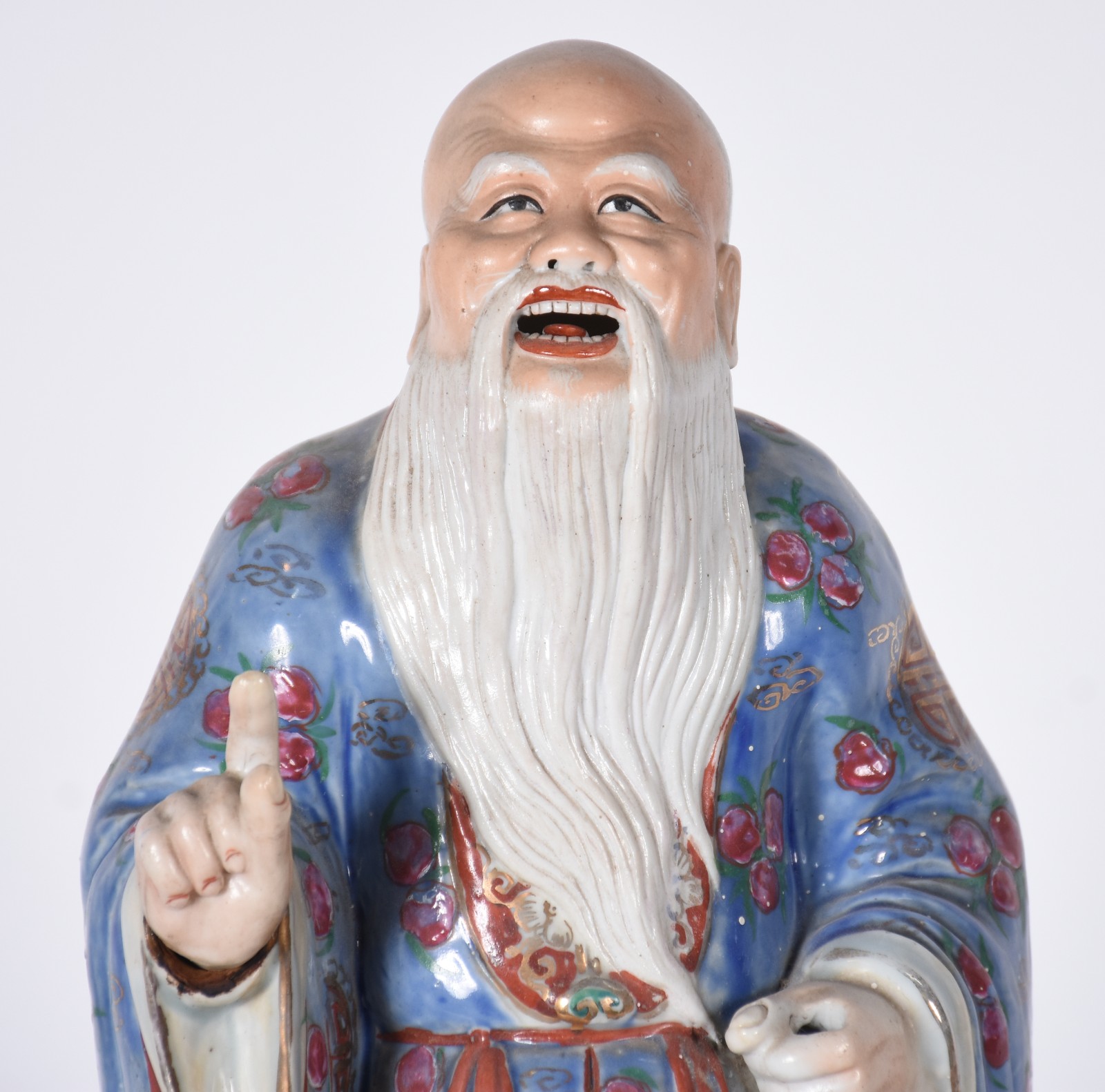 Estatueta de porcelana oriental policromada representando velho... - foto 2 de 9