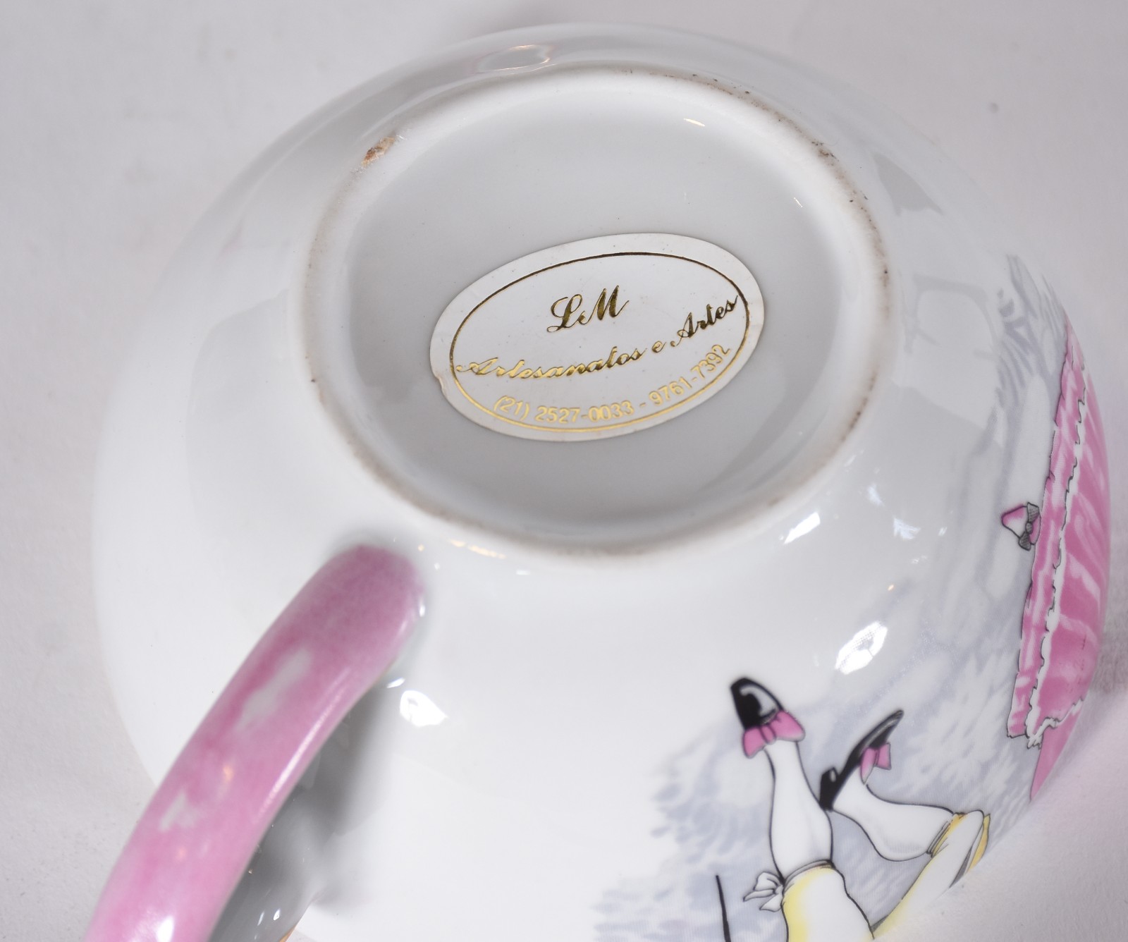 Diversas peças de porcelana policromada, sendo: um bule para chá... - foto 8 de 8