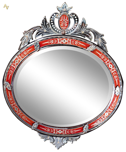 Espelho vezeniano feitio oval com detalhe em vermelho. Itália, década...