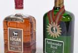 Duas garrafas de Whisky, sendo Logan 12 anos e ... - Duas garrafas de Whisky, sendo Logan 12 anos e Ambassador Royal 12 anos.