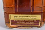 Duas garrafas de Whisky, sendo Logan 12 anos e ... - Duas garrafas de Whisky, sendo Logan 12 anos e Ambassador Royal 12 anos.