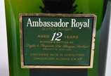 Duas garrafas de Whisky, sendo Logan 12 anos e ... - Duas garrafas de Whisky, sendo Logan 12 anos e Ambassador Royal 12 anos.