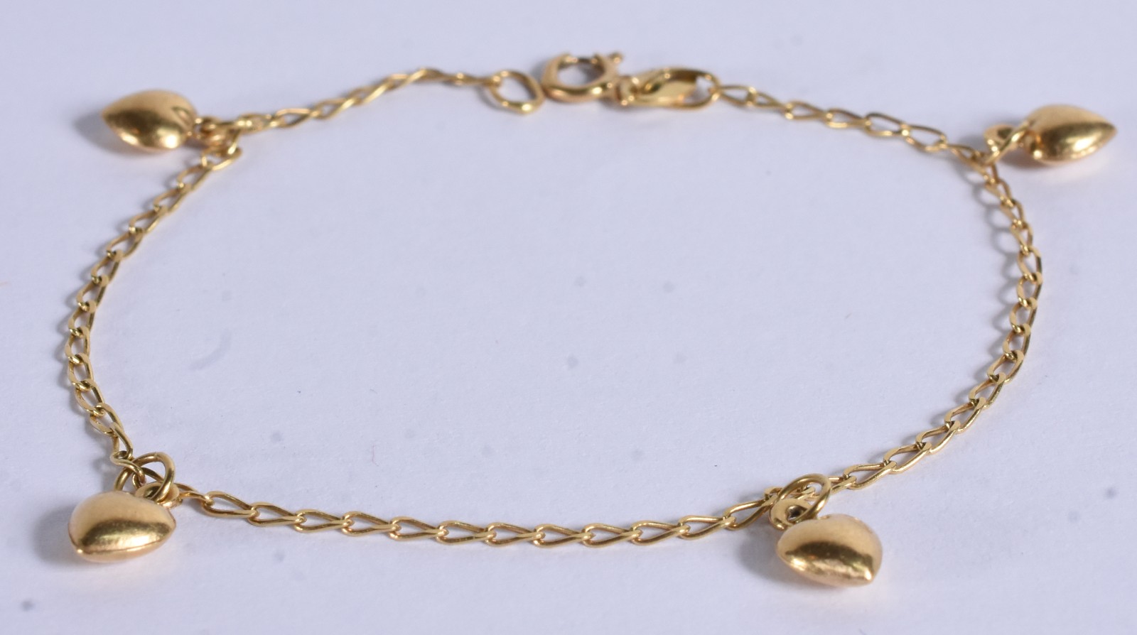 Pulseira de criança com 4 corações de ouro 18k, contraste 750 (Por... - foto 2 de 5