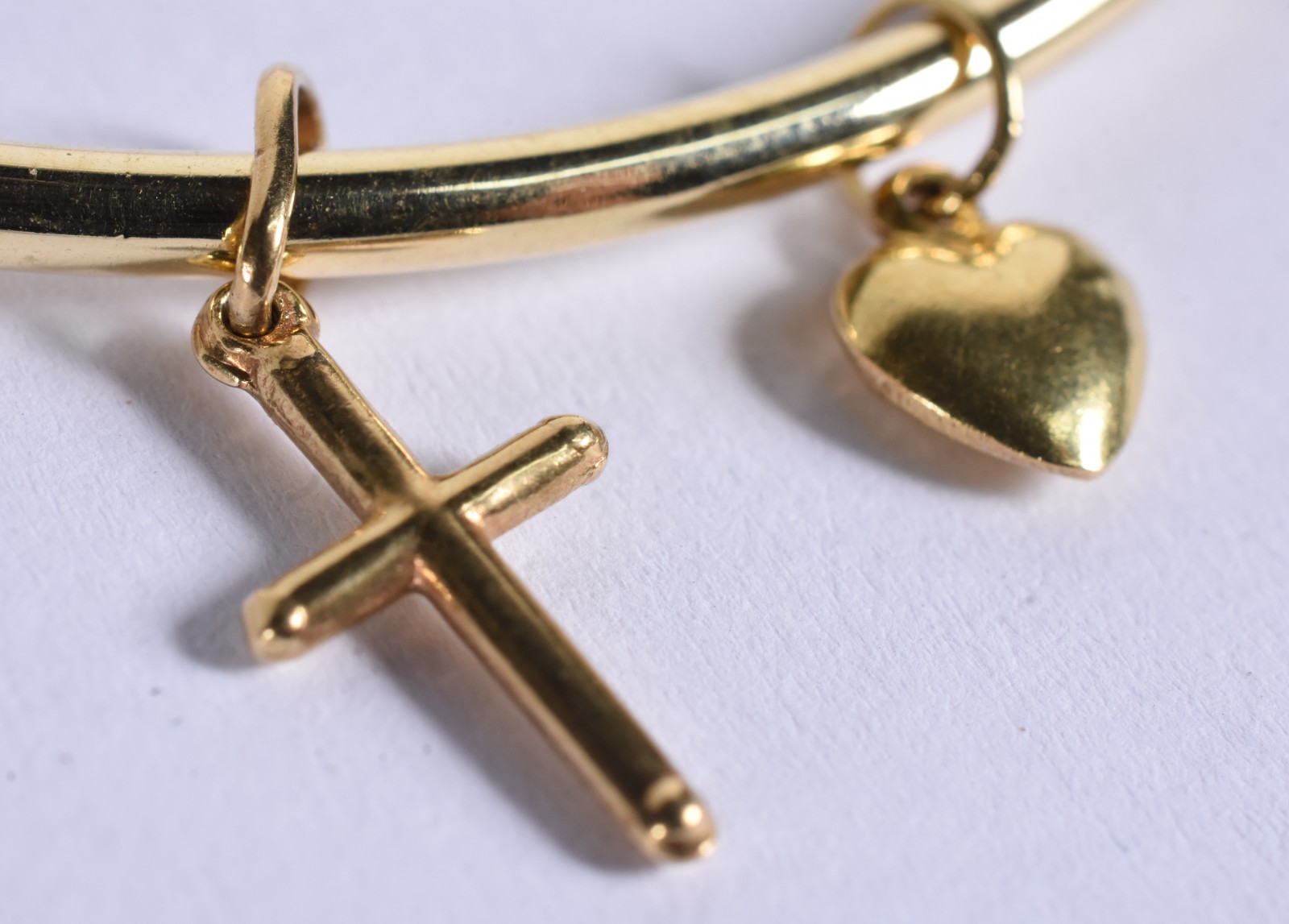 Pulseira escrava feitio oval de ouro 18 k com cruz e coração (Por... - foto 1 de 4