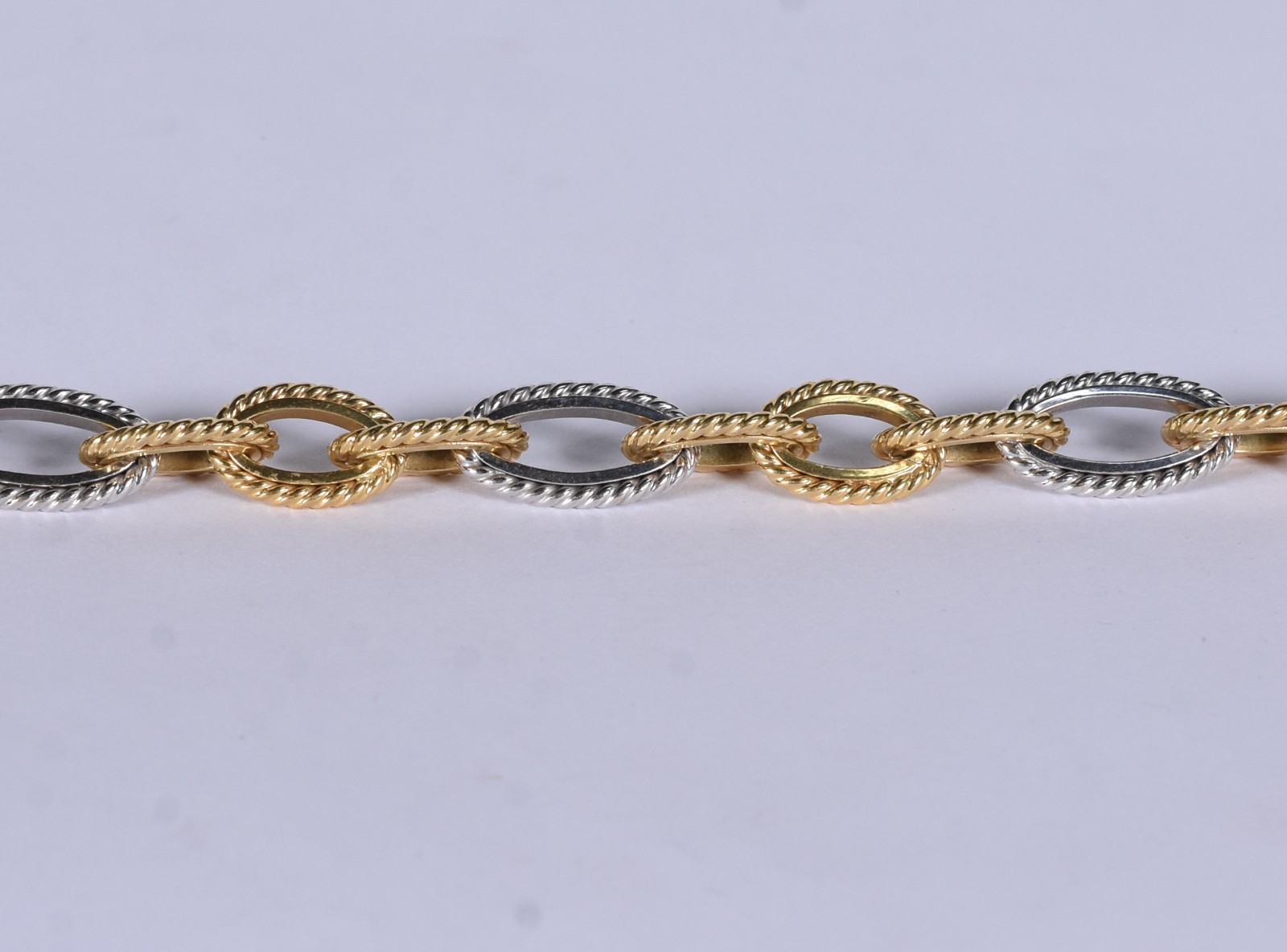Pulseira de ouro branco e ouro 18 k em elos ovais (Por motivos de... - foto 1 de 6