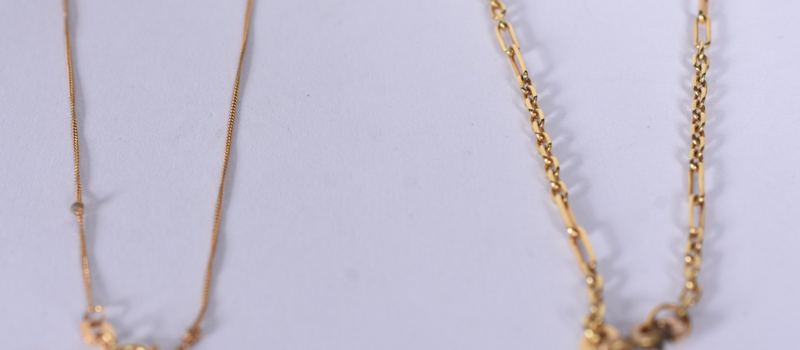 Dois cordões de ouro 18 k (Por motivos de segurança a peça não se... - foto 4 de 7