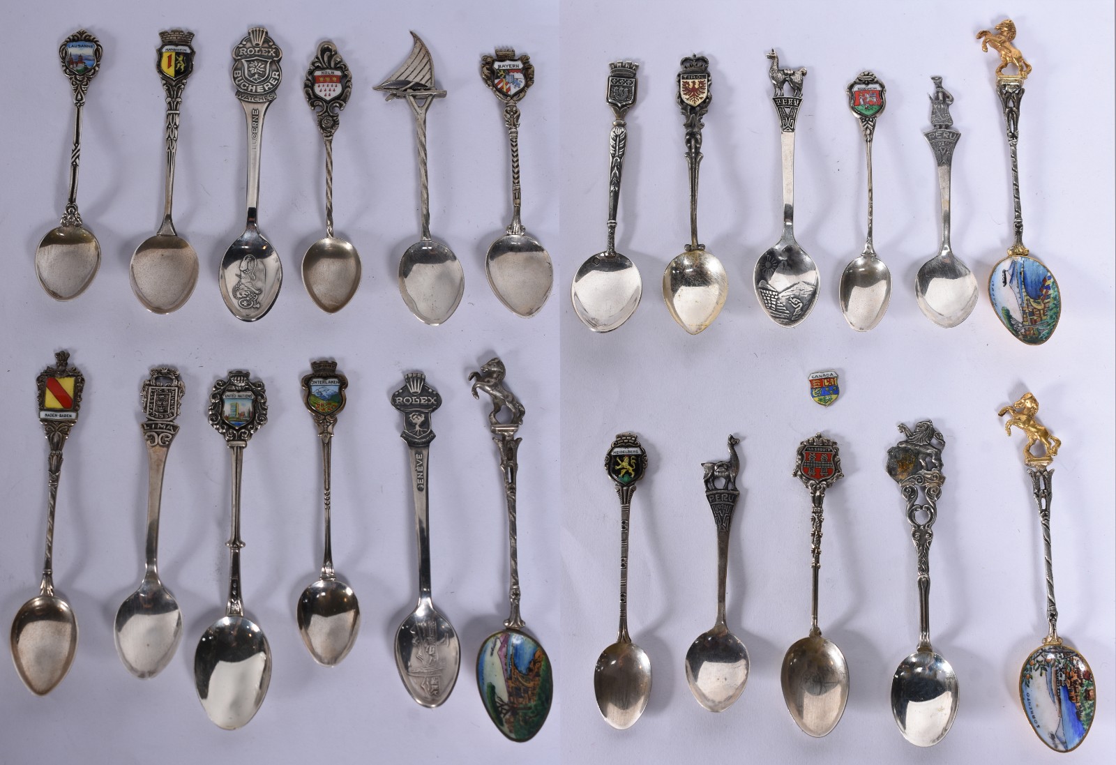 Vinte e três colheres diversas para café de prata de lei.Peso da... - foto 1 de 11