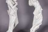 Duas estatuetas de biscuit branco representando... - Duas estatuetas de biscuit branco representando figuras femininas. Uma delas sem um braço.