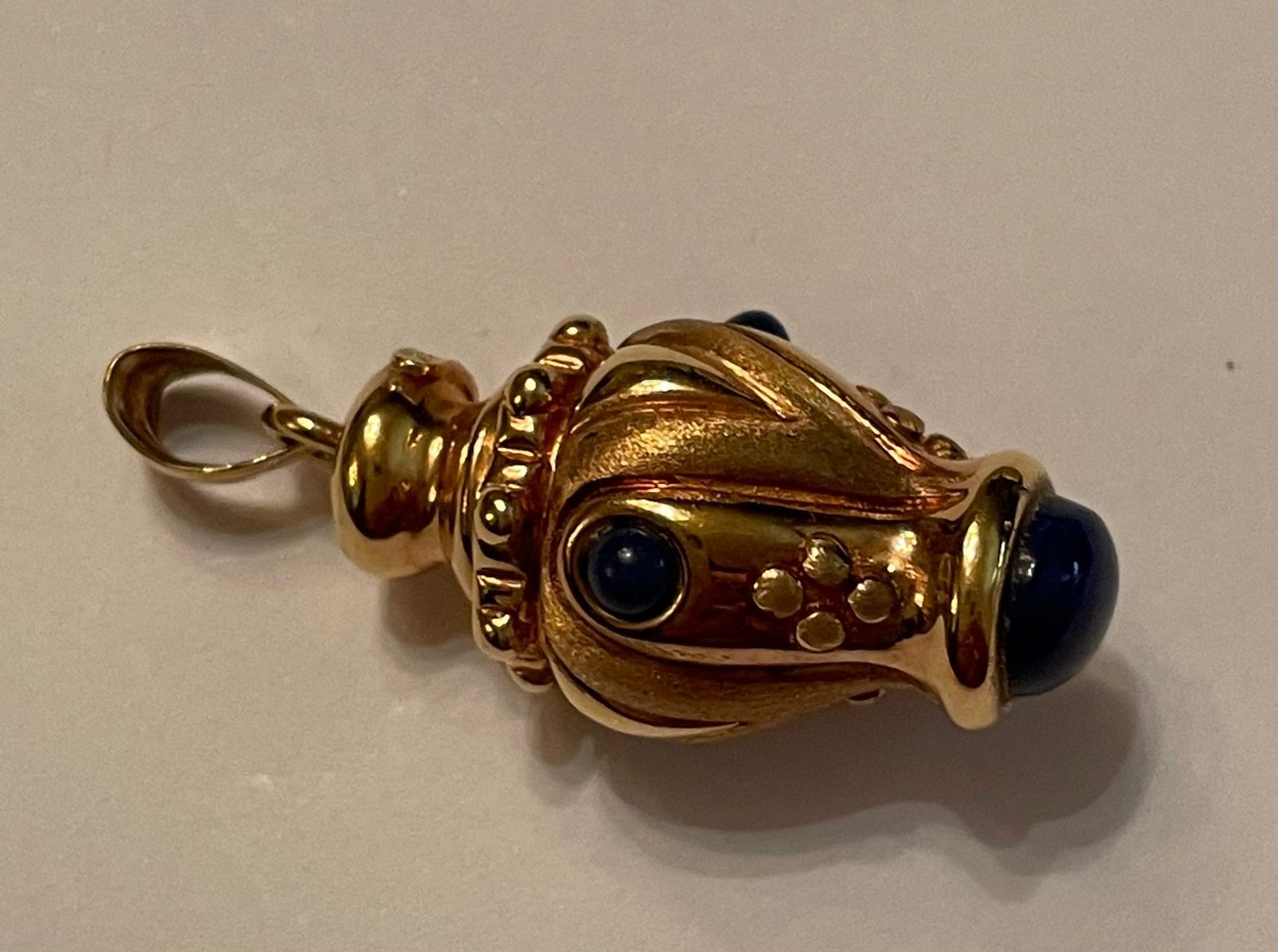 Cordão e pendente de ouro 18 k. (Por motivos de segurança a peça não... - foto 5 de 10