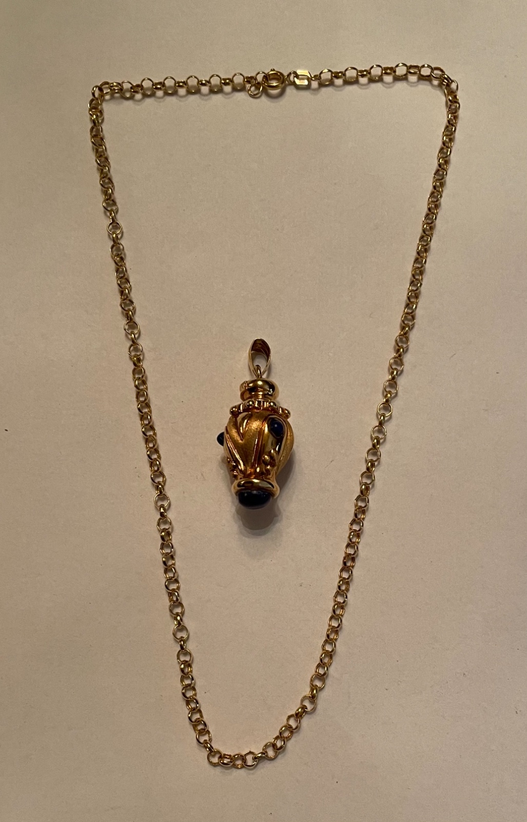 Cordão e pendente de ouro 18 k. (Por motivos de segurança a peça não... - foto 2 de 10