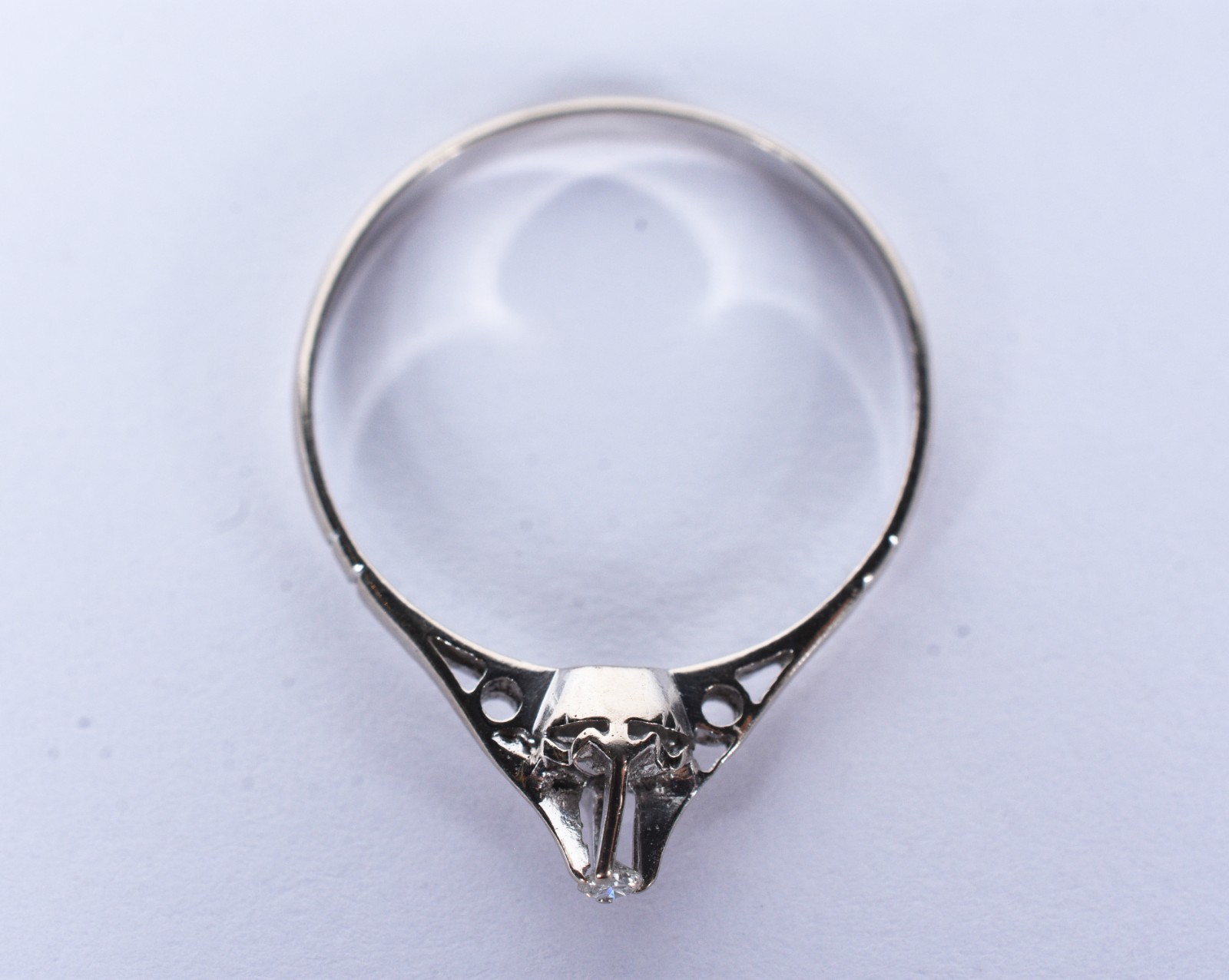 Solitário de ouro branco com um brilhante de 0,05 ct, aro 17 (Por... - foto 6 de 6
