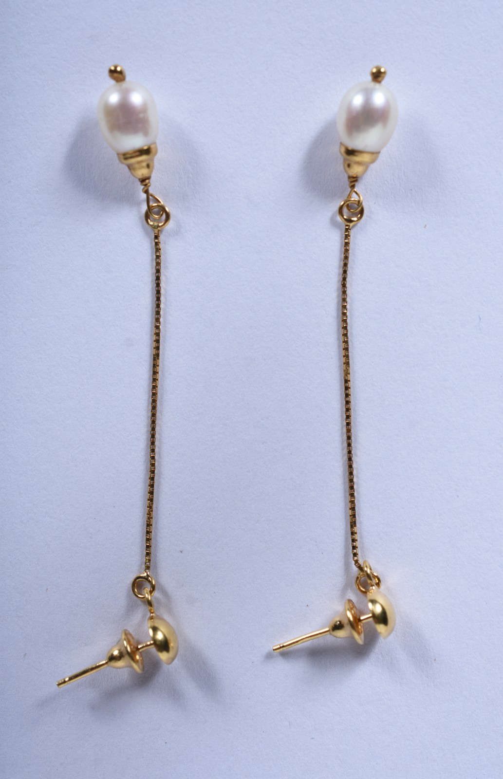 Par de brincos de ouro 18 k, contraste 750, pendente com 2 perolas... - foto 1 de 5