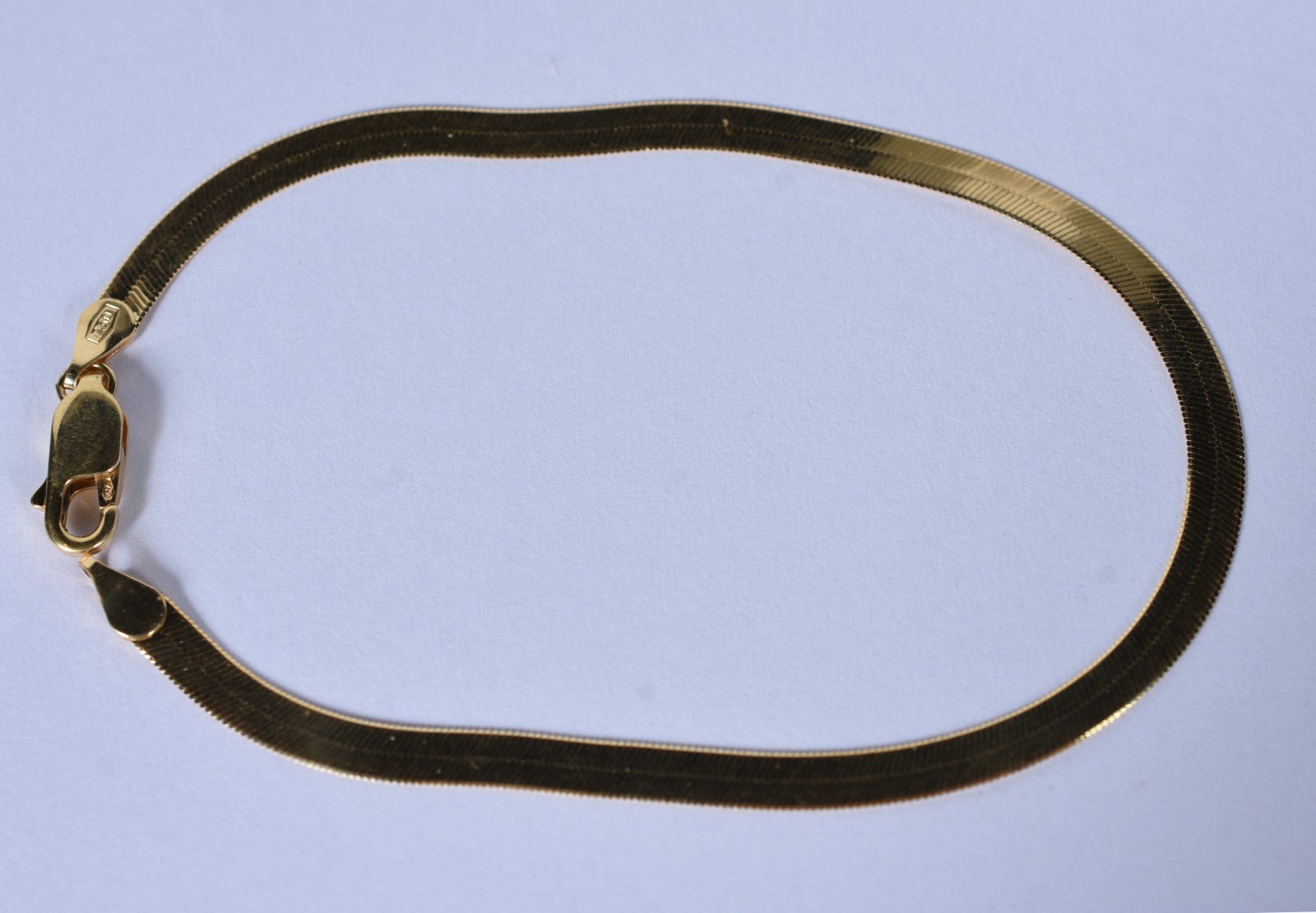 Pulseira de ouro 18 k, contraste 750 na forma de lâmina (Por motivos... - foto 1 de 5