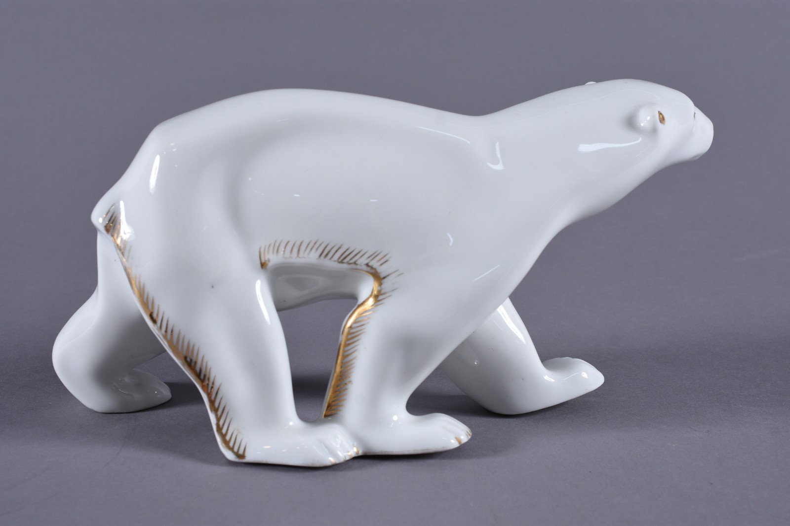 Escultura de porcelana branca representando urso polar - Ademir Rio. - foto 4 de 8