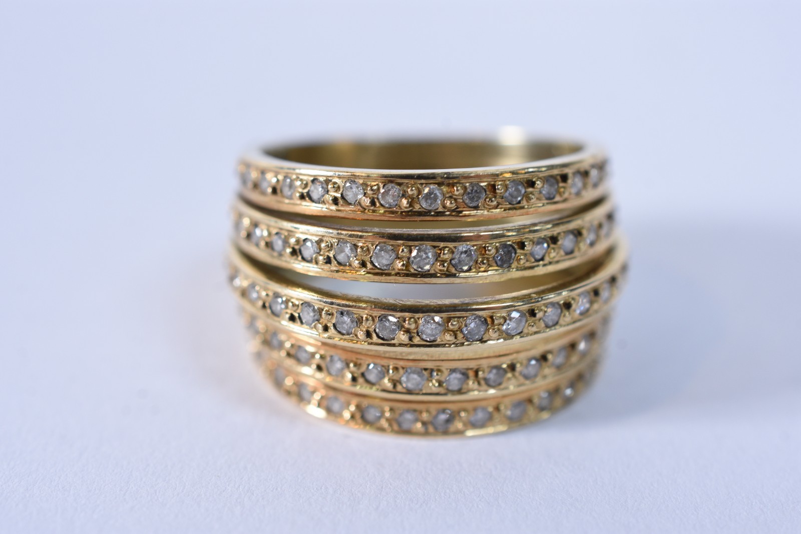 Anel de ouro 18 k, contraste 750 com 5 aros todos cravejados com... - foto 2 de 6