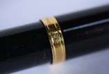 Waterman (1883),  - Caneta tinteiro francesa de metal dourado e preto, no estojo.