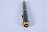 Waterman (1883),  - Caneta tinteiro francesa de metal dourado e preto, no estojo.
