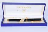 Waterman (1883),  - Caneta tinteiro francesa de metal dourado e preto, no estojo.