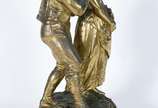 AUGUSTE BONNETAUD NADAUD (1835-1889),  - Grupo escultórico de metal dourado representando casal de camponeses. Assinado.