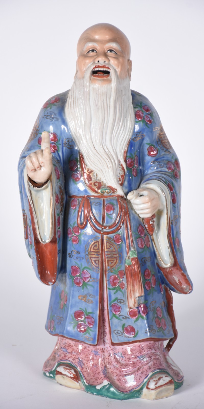 Estatueta de porcelana oriental policromada representando velho... - foto 1 de 7