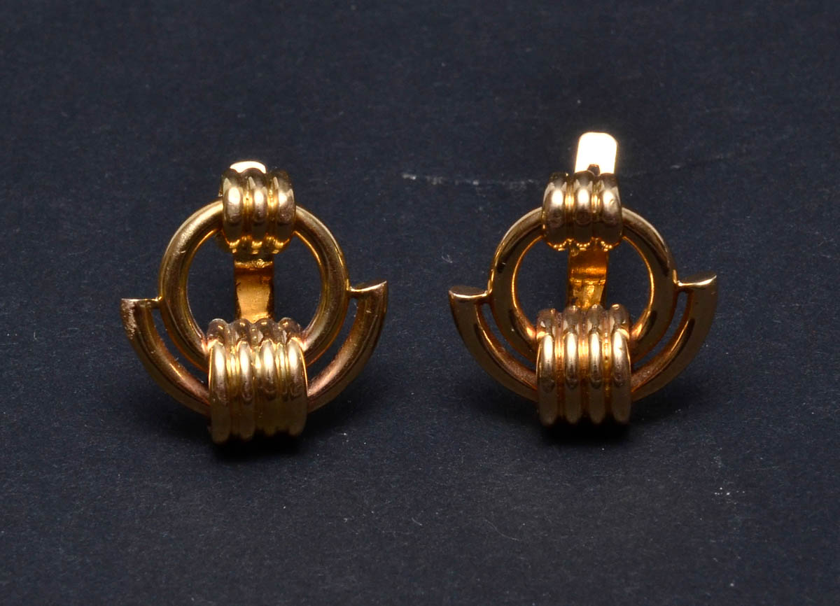 Par de brincos de ouro 18 k, amarelo, contrastado . Modelo circular...