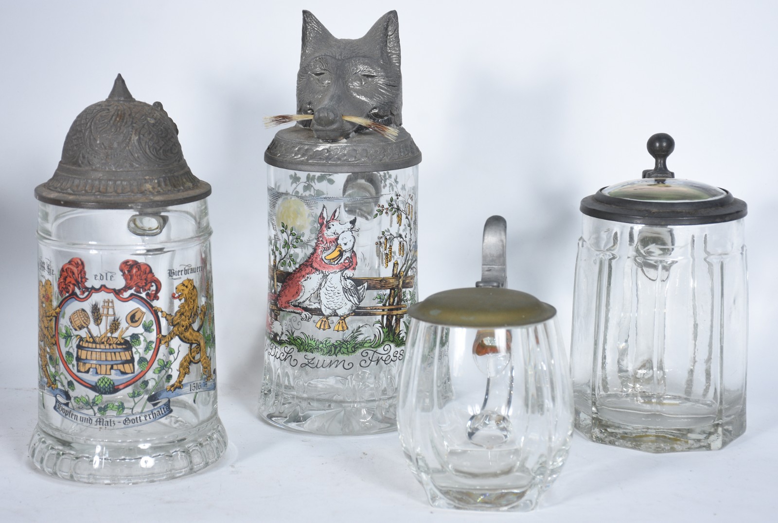 Quatro tankards diversos de cristal/vidro com tampas de metal... - foto 3 de 8