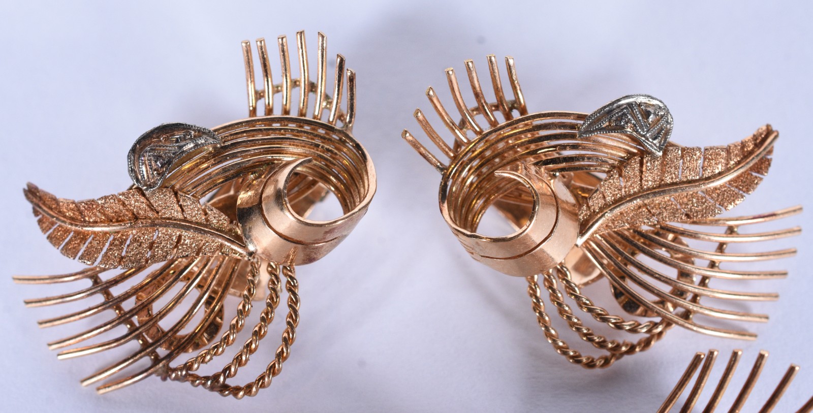 Conjunto composto de broche e par de brincos de pressão de ouro 18 k... - foto 3 de 8
