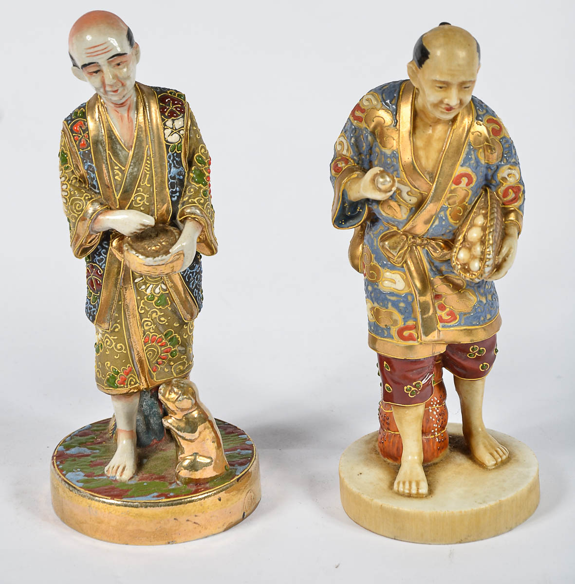 Par de figuras de porcelana japonesa policromada de Satzuma. Alt. 18...