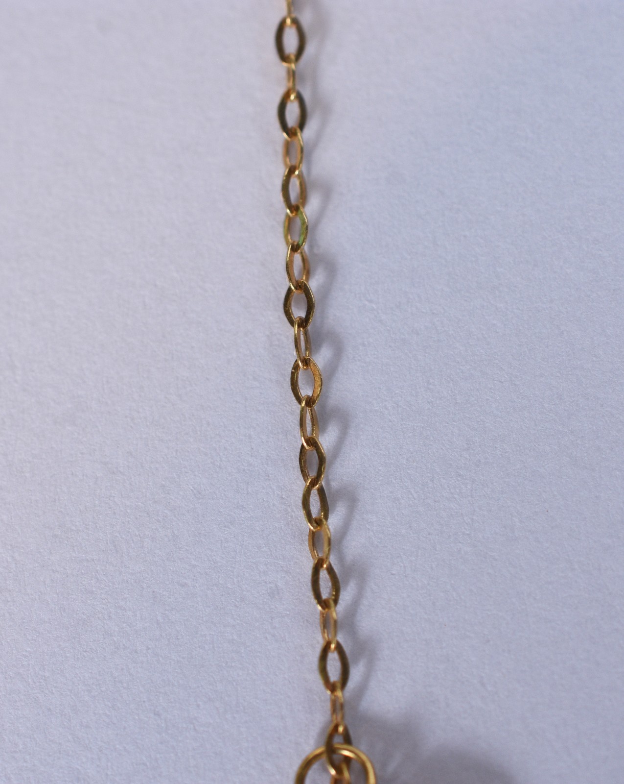 Tornozeleira de ouro 18 k, contraste 750 com pendentes (Por motivos... - foto 3 de 7