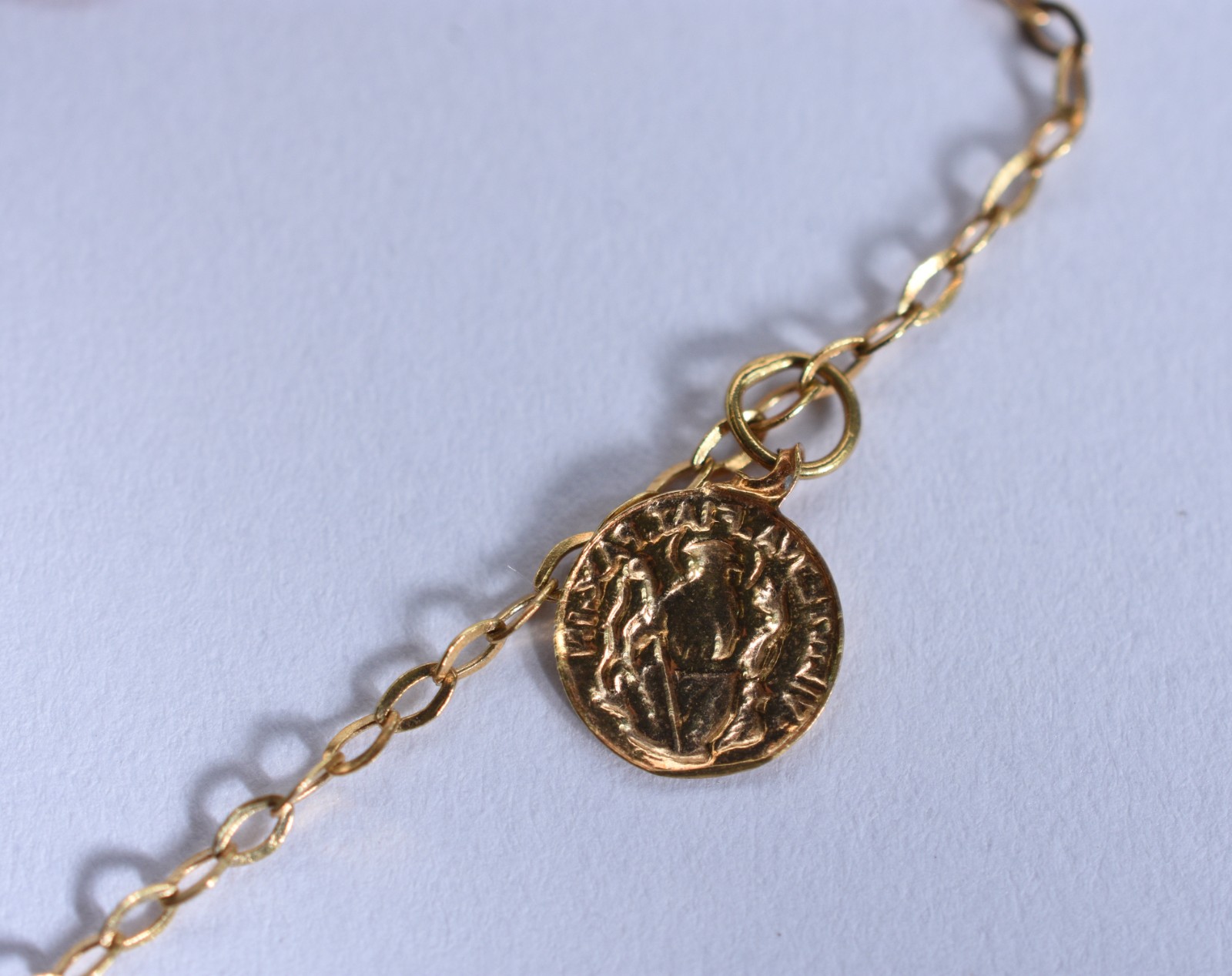 Tornozeleira de ouro 18 k, contraste 750 com pendentes (Por motivos... - foto 5 de 7