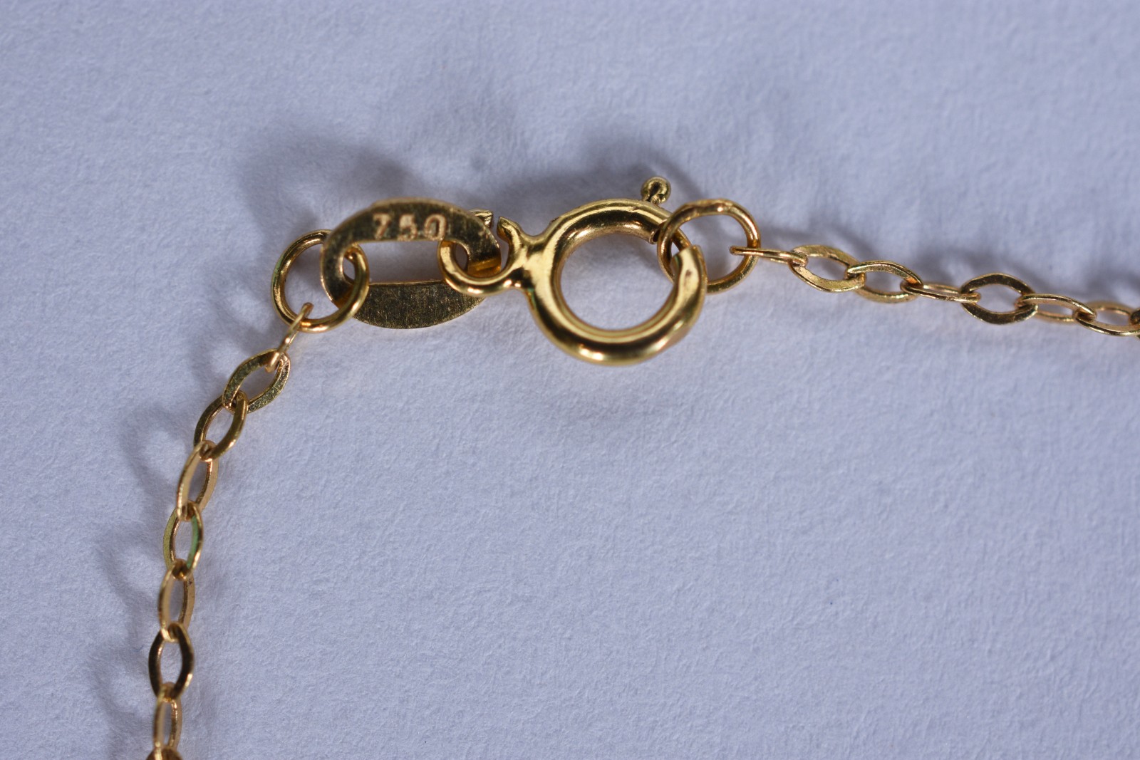 Tornozeleira de ouro 18 k, contraste 750 com pendentes (Por motivos... - foto 7 de 7