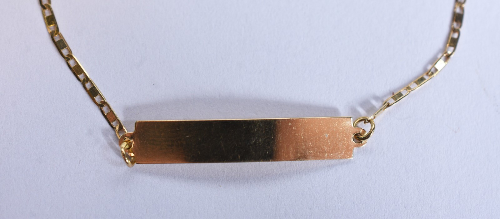 Pulseira de criança de ouro 18 k, contraste 750 com placa para gravar... - foto 1 de 6