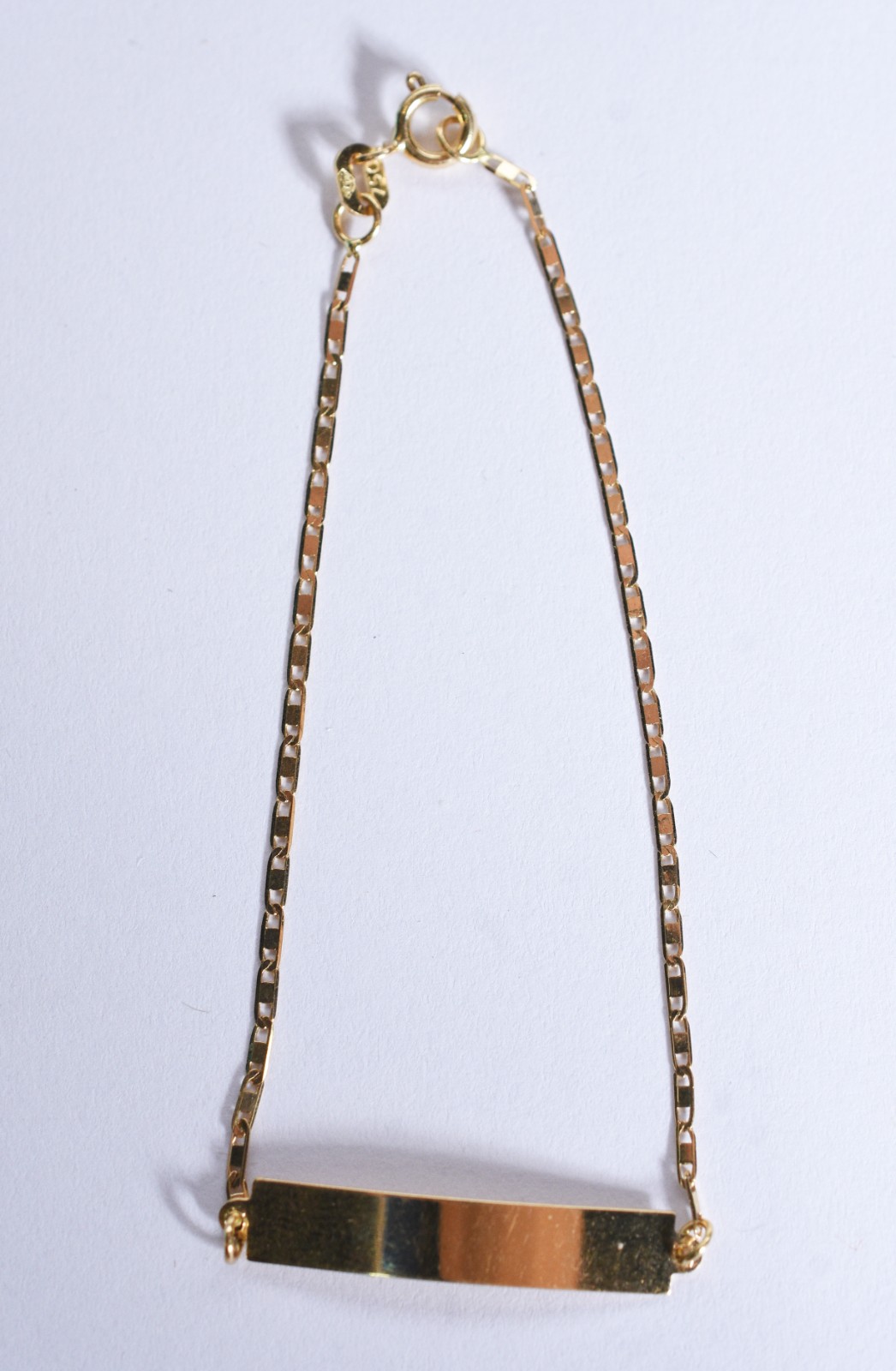 Pulseira de criança de ouro 18 k, contraste 750 com placa para gravar... - foto 2 de 6