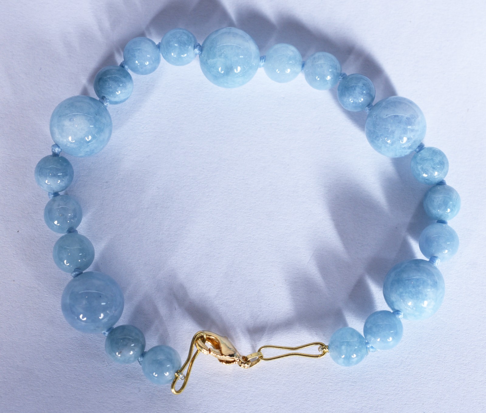 Pulseira com fecho mosquetão e argola em ouro 18 k, contraste 750... - foto 1 de 4