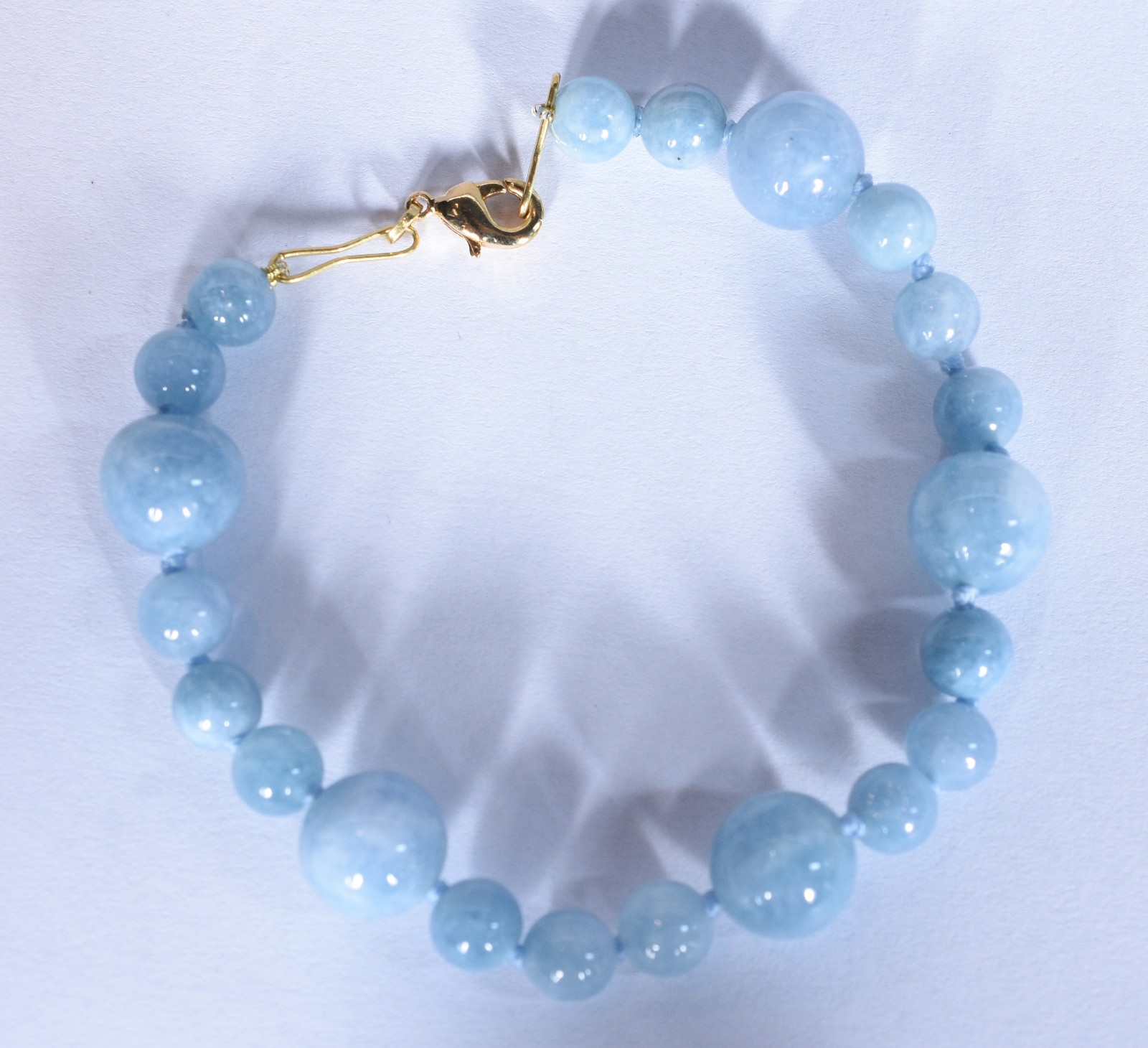 Pulseira com fecho mosquetão e argola em ouro 18 k, contraste 750... - foto 2 de 4