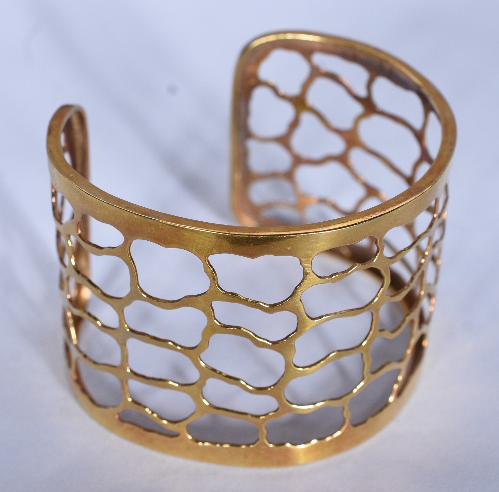 Bracelete de ouro 18 k., design moderno com vazados (Por motivos de... - foto 1 de 6