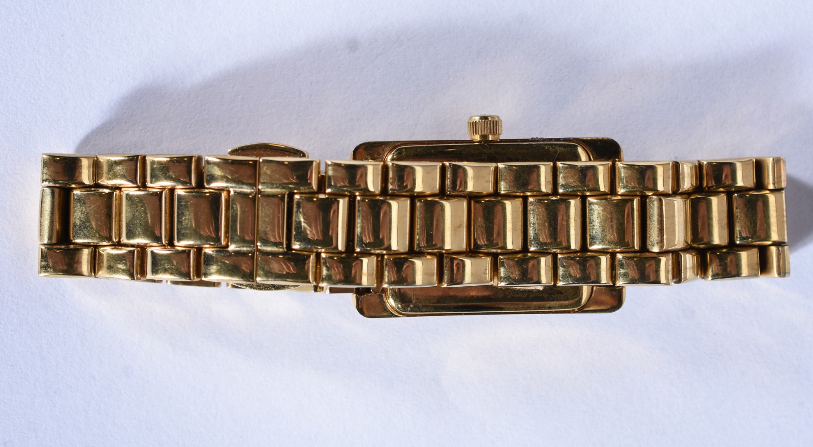 Relógio de pulso de metal dourado. - foto 4 de 10