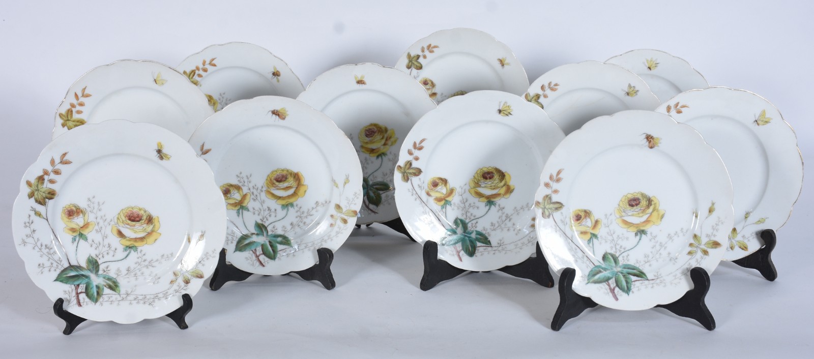 Conjunto com onze pratos de sobremesa de porcelana francesa "Velho... - foto 1 de 5