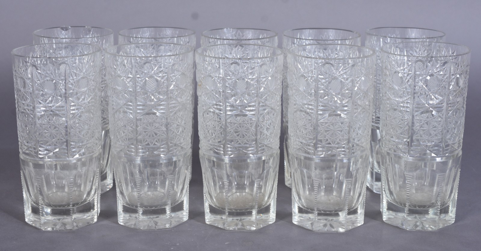Dez copos longos de cristal lapidado bases facetadas. - foto 1 de 10