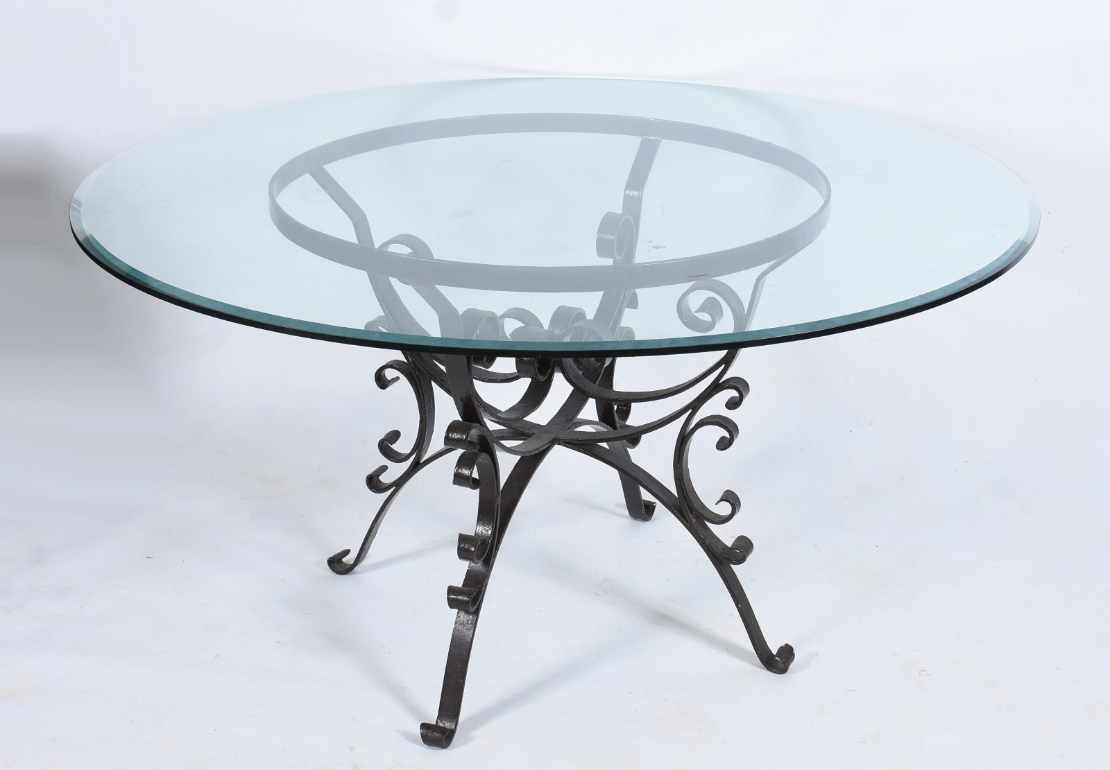 Mesa de jantar de metal com tampo de vidro bisotado. - foto 1 de 5