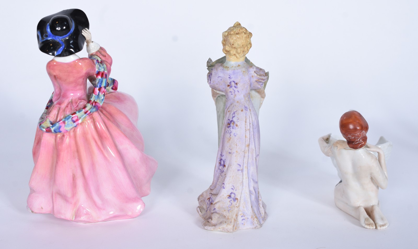 Três estatuetas de porcelana, sendo a maior, inglesa Royal Doulton... - foto 3 de 10