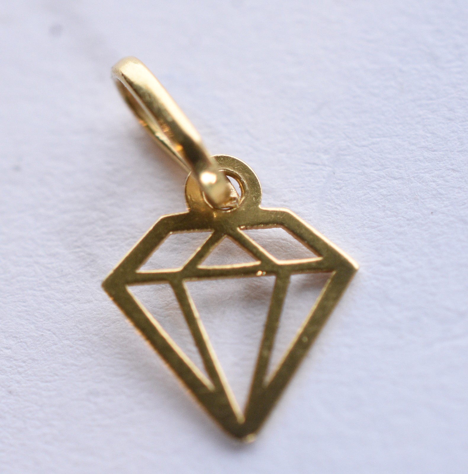 Seis pingentes de ouro 18 k e ouro branco, contraste 750 (Por motivos... - foto 2 de 11