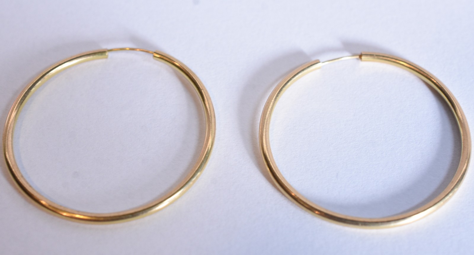 Par de brincos de ouro 18k, contraste 750 modelo argola (Por motivos... - foto 6 de 6