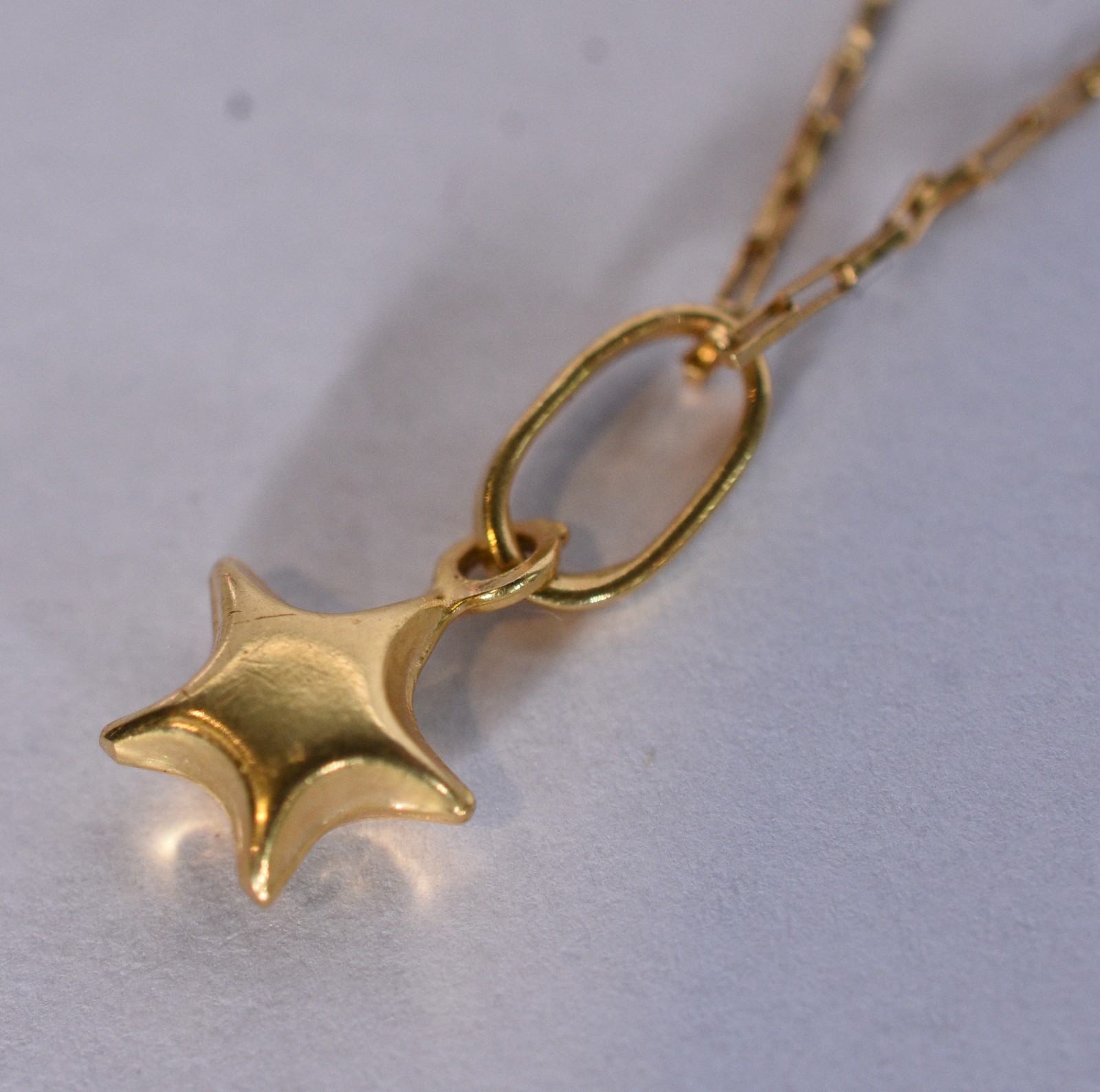 Cordão e pingente de ouro 18 k, contraste 750 feitio elinhos e... - foto 5 de 6