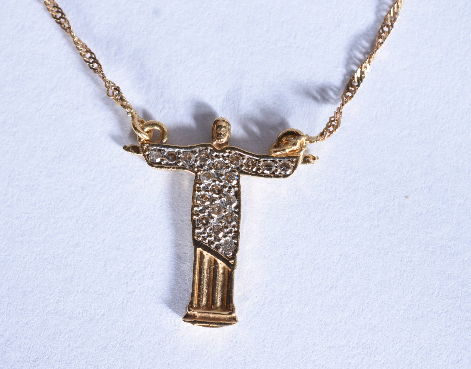 Cordão com pingente de ouro 18k, contraste 750 feitio torcido com... - foto 1 de 7