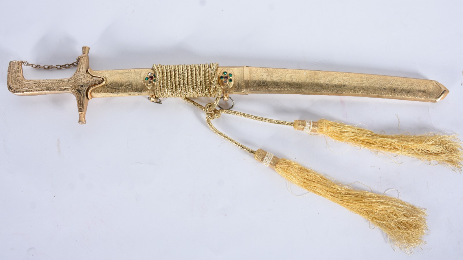 Espada Katana com bainha de metal dourado trabalhado. - foto 2 de 8