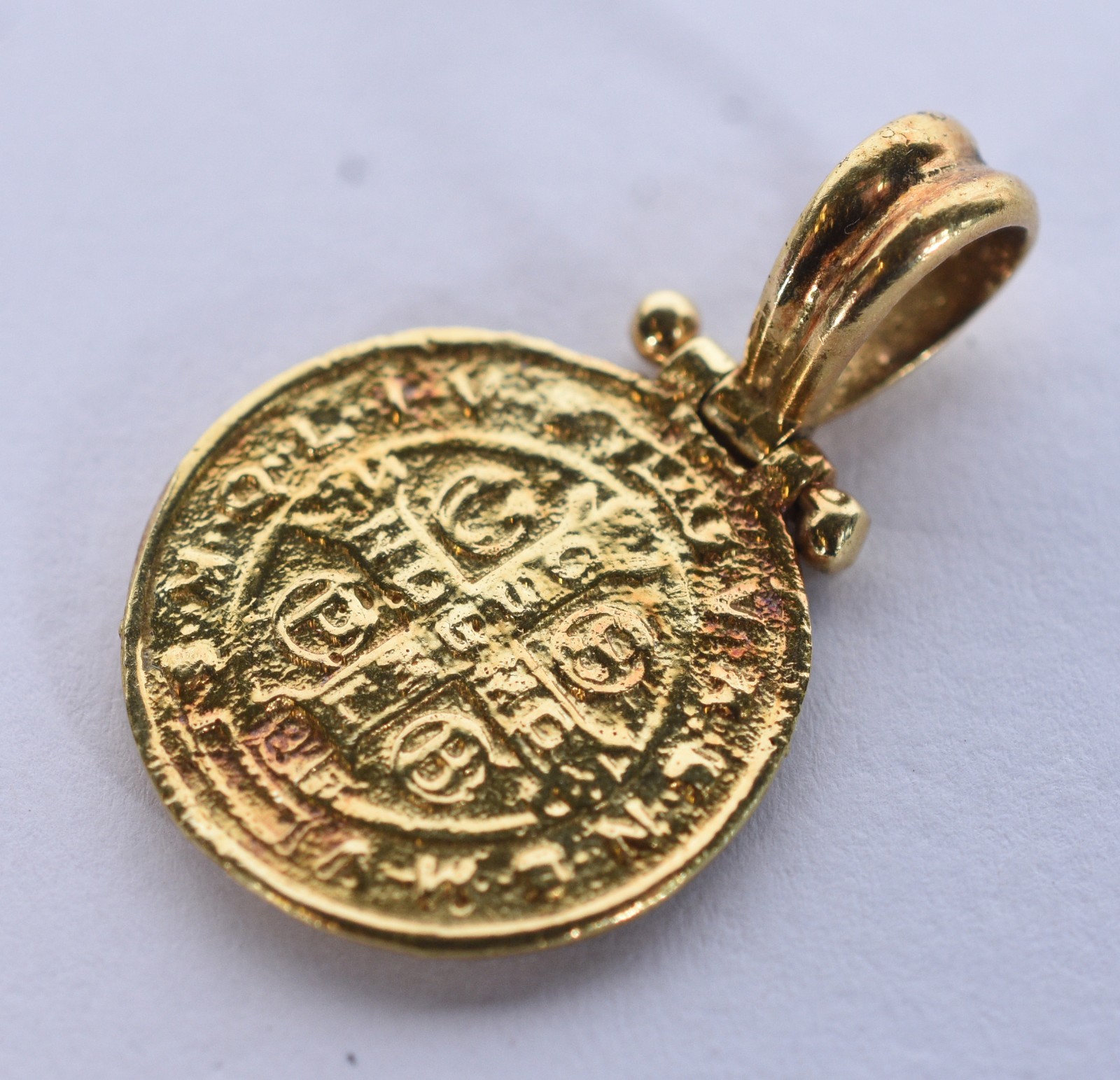 Pendente de ouro 18 k (Por motivos de segurança a peça não se... - foto 1 de 4
