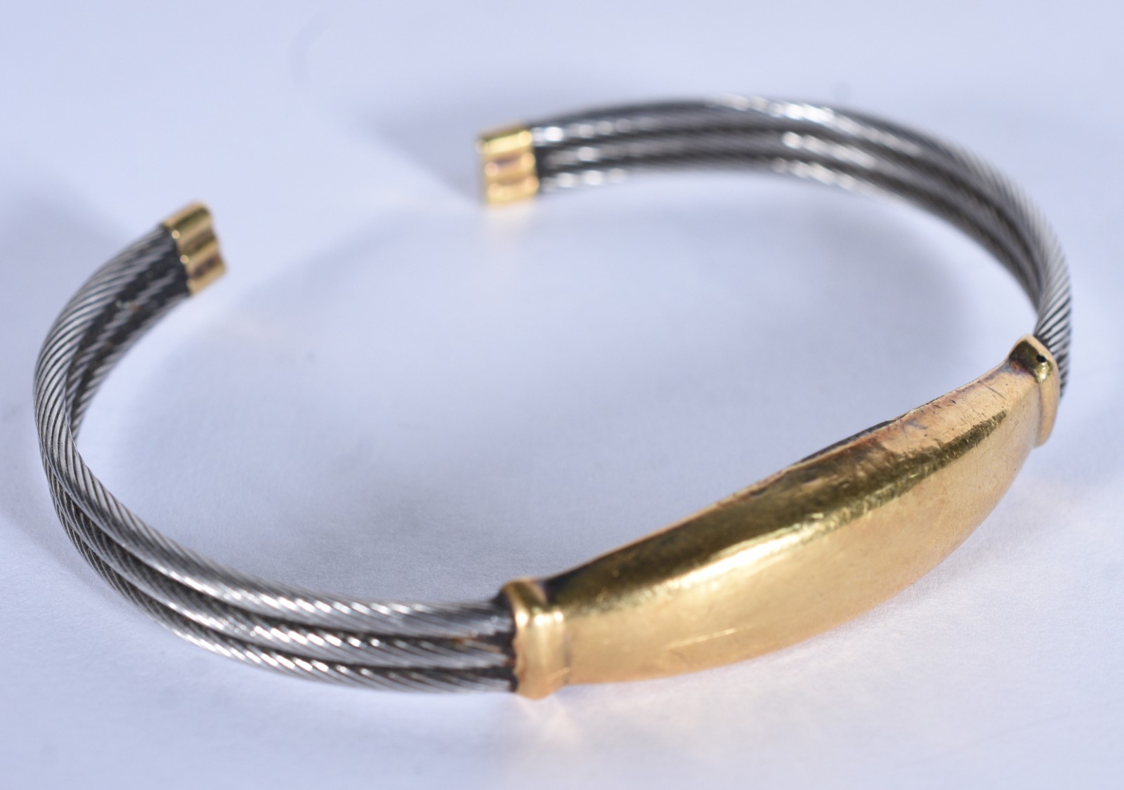 Pulseira de aço com detalhes em ouro 18 k (Por motivos de segurança a... - foto 2 de 5